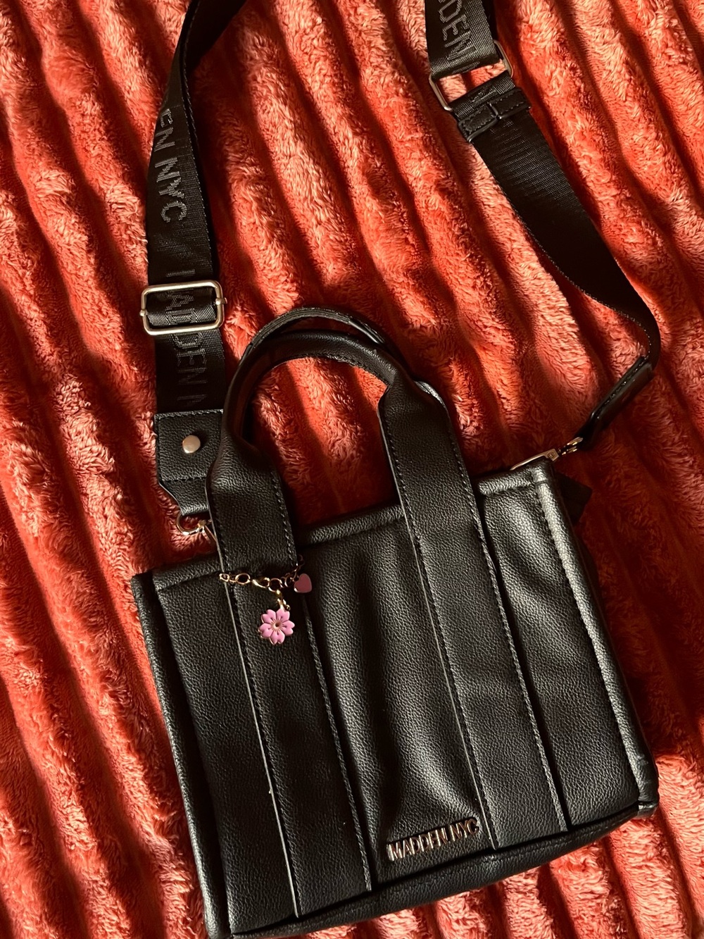 Madden NYC Black Leather Crossbody Tote with Floral Charm